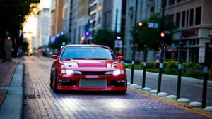 Speed And Style: Red Nissan Silvia S14 Wallpaper