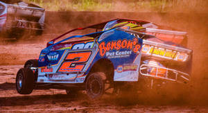 Speed And Thrills Await On The Dirt Track Wallpaper