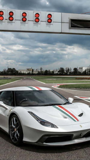 Speed Towards Your Goals With A White Ferrari Iphone Wallpaper