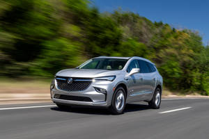 Speeding Silver Buick Enclave Wallpaper