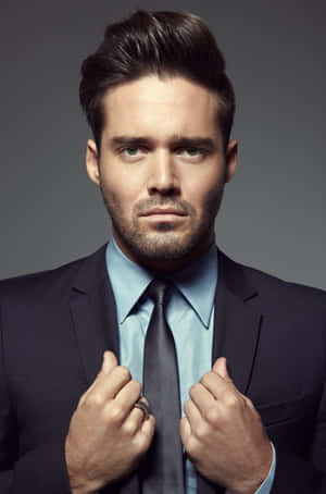 Spencer Matthews Posing For A Professional Photoshoot Wallpaper