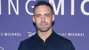 Spencer Matthews Smiling At An Event Wallpaper