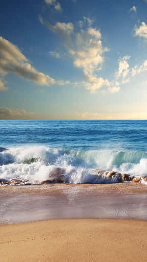 Spend The Day At The Beach With Your Cute Beach Iphone! Wallpaper