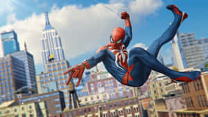 Spider-man Gracefully Swings Through The City Wallpaper