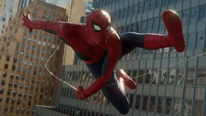 Spider-man Swinging Through The City Wallpaper