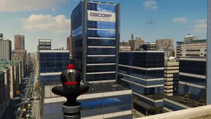 Spiderman Perched Above Oscorp Building Wallpaper