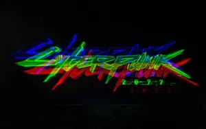 Spiky And Vibrant, The Rgb Logo For Cyberpunk 2077 Wallpaper
