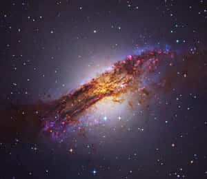 Spiraling Elliptical Galaxy In The Universe Wallpaper