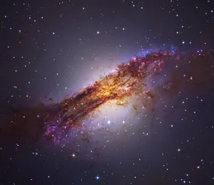 Spiraling Elliptical Galaxy In The Universe Wallpaper