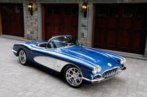 Splendid Chevrolet Corvette C1 On A Scenic Route Wallpaper