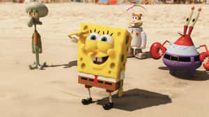 Sponge Bob_ Square Pants_ Movie_ Characters_ On_ Beach Wallpaper