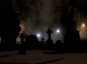 Spooky Halloween Night In A Graveyard. Wallpaper