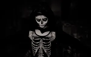 Spooky Halloween Skeleton In The Haunted Forest Wallpaper