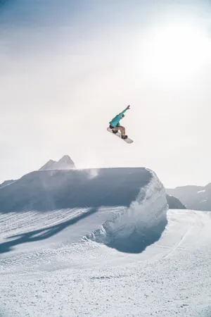 Sport Snowboarding In Snow-covered Mountain Wallpaper