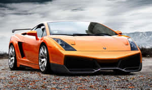 Sporty Elegance - Lamborghini Gallardo On The Open Road Wallpaper