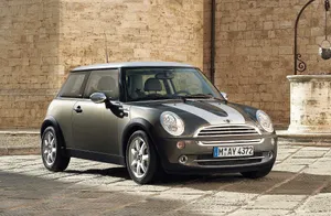 Sporty Red Mini Cooper S On A Mountain Road Wallpaper