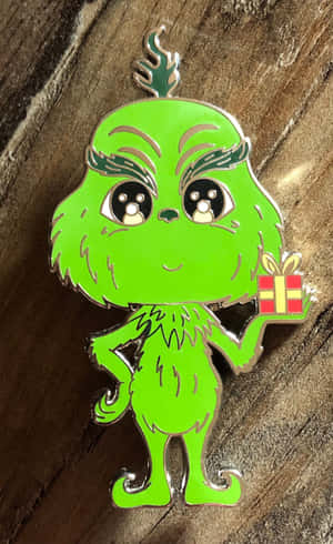 Spread The Christmas Spirit With This Cute Grinch! Wallpaper