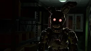 Springtrap In The Shadows - A Menacing Springtrap Character Lurking In The Darkness Wallpaper