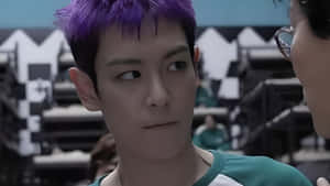 Squid Game Player Intense Stare Wallpaper