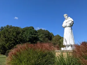 St Francis Statue Outdoor Setting Wallpaper