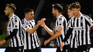 St Mirren Players Celebrating Victory Wallpaper