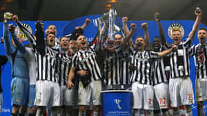 St Mirren Team Celebrationwith Trophy Wallpaper