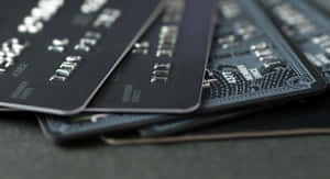 Stacked Black Credit Cards Wallpaper