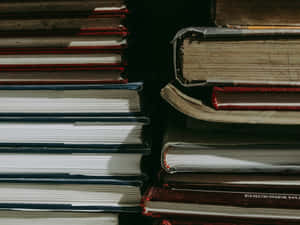 Stacked Books Texture Wallpaper