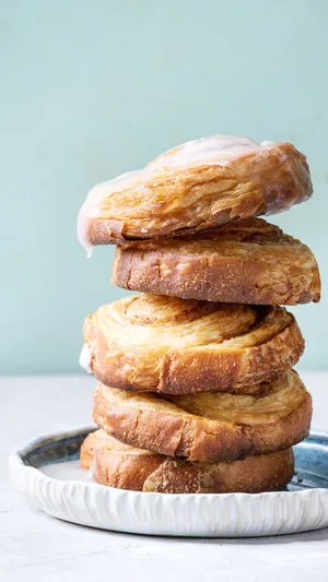 Stacked Cinnamon Rolls Glazed Wallpaper