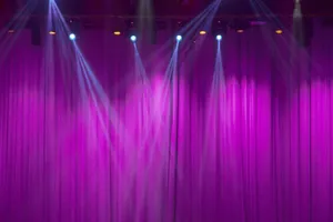 Stage Lightson Purple Curtains Wallpaper