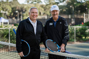 Stan Smith Wearing A Black Adidas Jacket Wallpaper