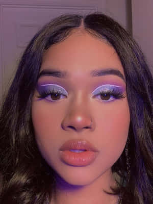 Stand Out From The Crowd With Purple Eye Shadow Wallpaper