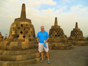 Standing Near Stupa Borobudur Temple Wallpaper