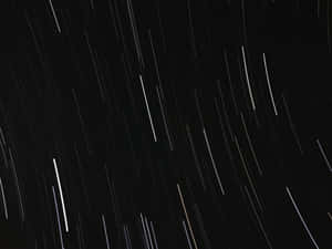 Star Trails In The Night Sky Wallpaper