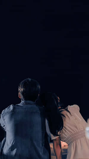 Stargazing Couple Night Sky Wallpaper