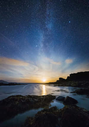 Starry_ Night_ Moonset_by_the_ Coastline.jpg Wallpaper