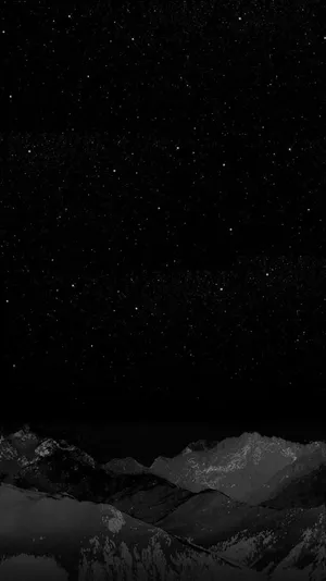 Starry_ Night_ Over_ Snowy_ Mountains Wallpaper