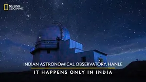 Starry Night Sky Over A Mountain Observatory Wallpaper