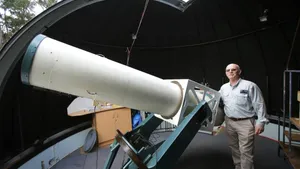 Starry Night Sky Over An Observatory Wallpaper