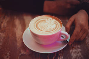 Start Your Day Off Right With A Delicious Cappuccino. Wallpaper