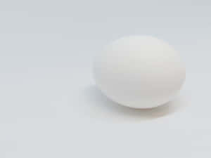 Start Your Day Right With Freshly Broken Egg White Wallpaper