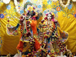 Statues Of Krishna And Radha In Iskcon Temple Wallpaper