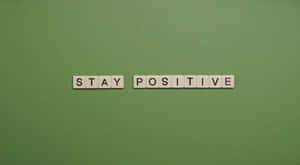 Stay Positive Green Background Wallpaper