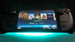 Steam Deck Gaming Sessionin Dark Room.jpg Wallpaper