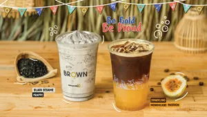 Steaming Brown Coffee In A White Cup Wallpaper