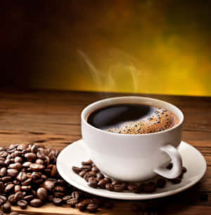 Steaming Coffee Cupand Beans.jpg Wallpaper