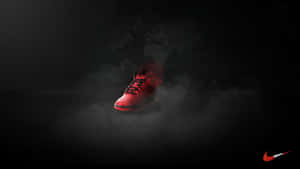 Stellar Red Nike Sneakers In Action Wallpaper