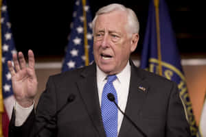 Steny Hoyer Passionately Raising His Hand While Delivering A Powerful Speech. Wallpaper