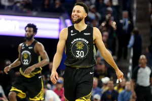 Steph Curry Smiling While Walking On Court Wallpaper
