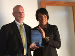 Stephanie Rawlings Blake Holding Trophy Wallpaper